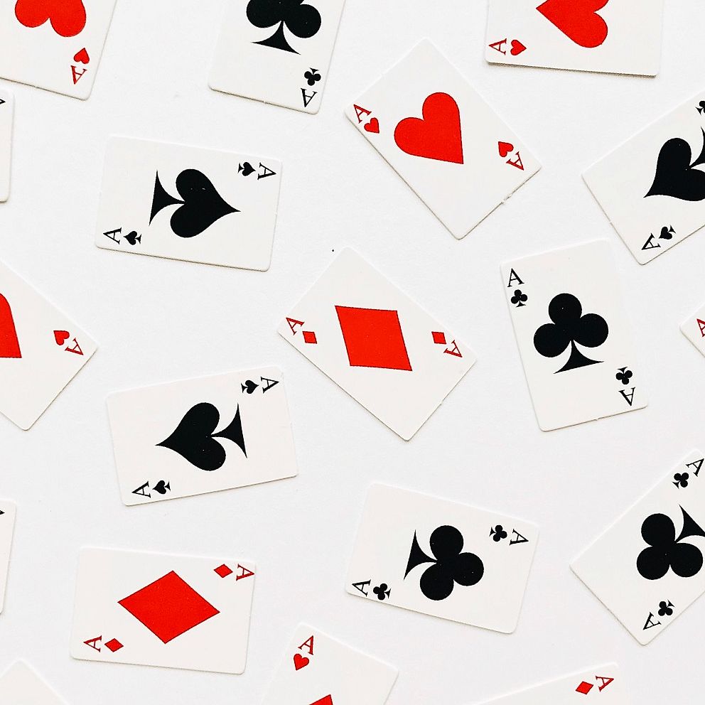 poker cards on white table